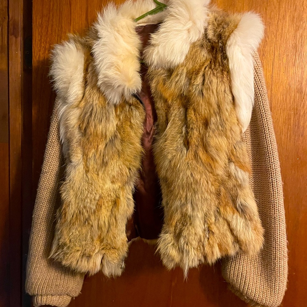 Fur jacket with knit sleeves